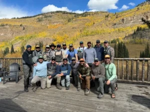 Group photo from a Fly Fishing retreat to support men's mental health in Colorado by Fishing The Good Fight.